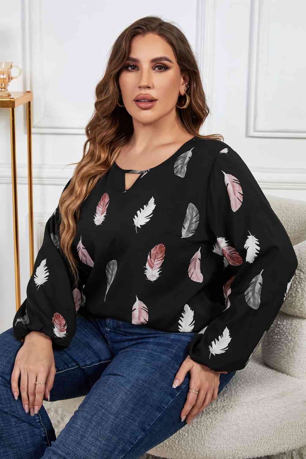 Melo Apparel Plus Size Printed Round Neck Long Sleeve Cutout Blouse